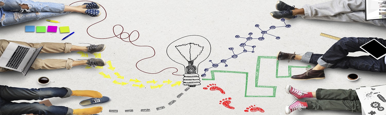 Image of six people lying on the floor, three sets of legs on each side, with a path drawn on the floor from their feet to the lightbulb in the middle of the image.